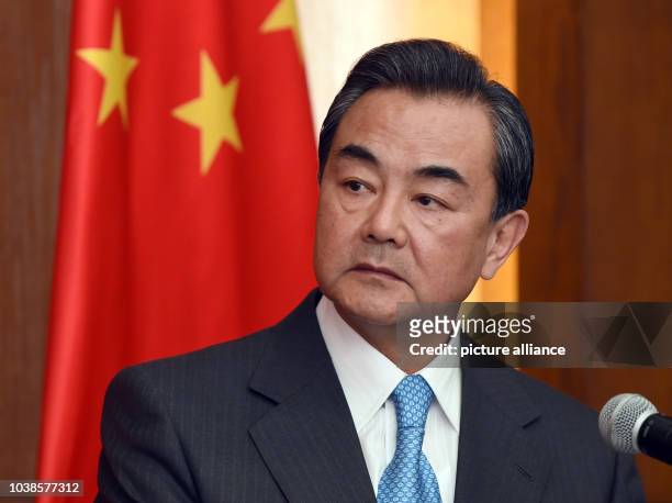 Chinese Foreign Minister Wang Yi gives a press conference with German Foreign Minister Steinmeier in Beijing, China, 14 April 2014. German Foreign...