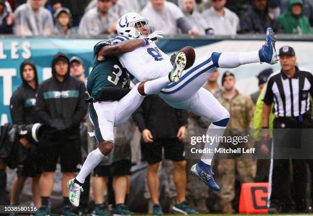 Defensive back Jalen Mills of the Philadelphia Eagles breaks up a pass intended for tight end Eric Ebron of the Indianapolis Colts during the third...