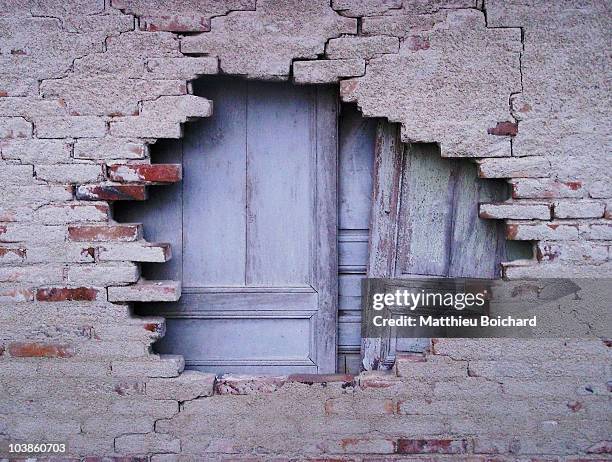 the hole - brick wall hole stock pictures, royalty-free photos & images