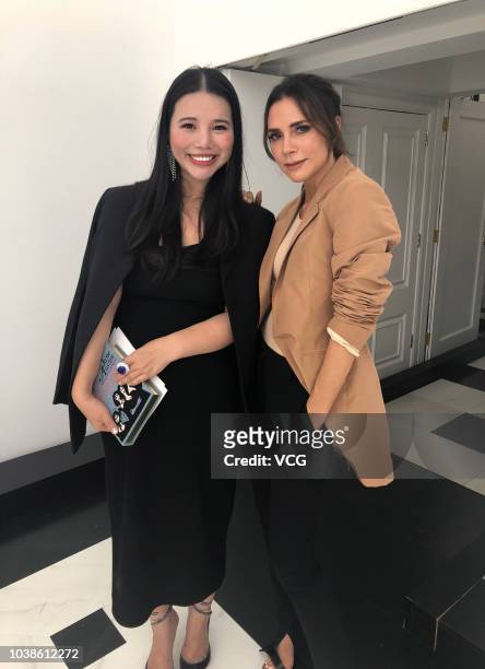 Chinese fashion investor Wendy Yu poses with English fashion designer Victoria Beckham during the London Fashion Week September 2018 on September 16,...