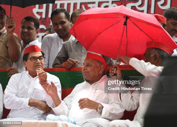 Samajwadi party leaders Mulayam Singh and Ram Gopal Yadav during a public rally, at Jantar Mantar, on September 23, 2018 in New Delhi, India.