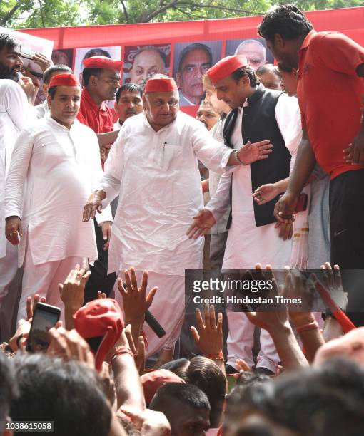 Samajwadi Party patriarch Mulayam Singh Yadav and Samajwadi Party chief Akhilesh Yadav during a public rally, at Jantar Mantar, on September 23, 2018...