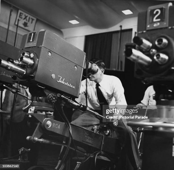 An NBC cameraman at work recording a television show, USA, circa 1945.