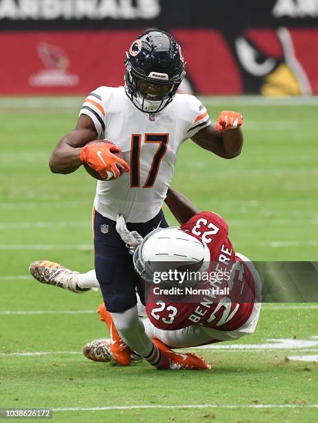 Anthony Miller of the Chicago Bears is tackled by Bene Benwikere of the Arizona Cardinals during the first quarter at State Farm Stadium on September...