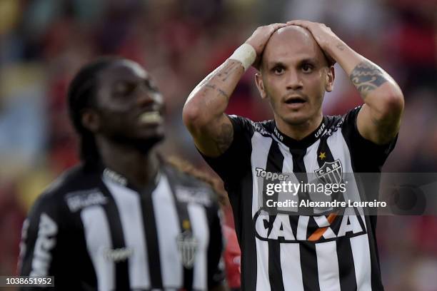 Fábio Santos and Yimmi Chará of Atletico-MG reacts during the match between Flamengo and Atletico-MG as part of Brasileirao Series A 2018 at Maracana...