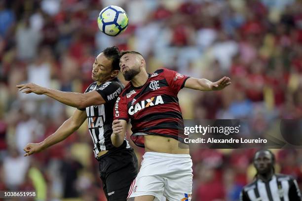 Léo Duarte of Flamengo struggles for the ball with Ricardo Oliveira of Atletico-MG during the match between Flamengo and Atletico-MG as part of...