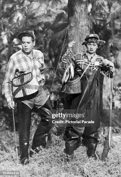 American actress Lucille Ball with her husband Desi Arnaz in 'The Camping Trip', an episode of the television show 'I Love Lucy', 1953. It first...