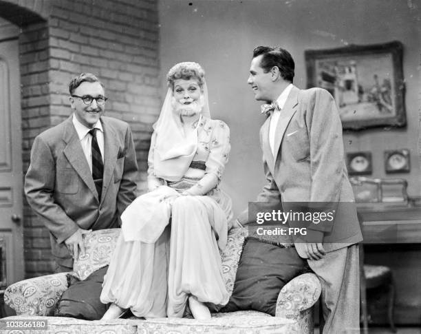 American comedienne Lucille Ball wearing harem pants and a false beard for 'The Moustache', an episode of the television series 'I Love Lucy', 1952....