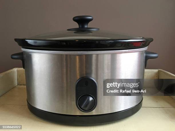 electric slow cooker - crock pot stock pictures, royalty-free photos & images