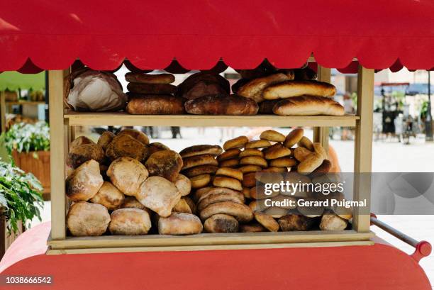 a market stall selling bread - mdina stock pictures, royalty-free photos & images