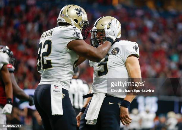 New Orleans Saints quarterback Drew Brees celebrates his touchdown with tight end Benjamin Watson in an NFL football game between the New Orleans...