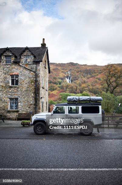 4x4 in scottish highlands during road trip - 4x4 stock pictures, royalty-free photos & images