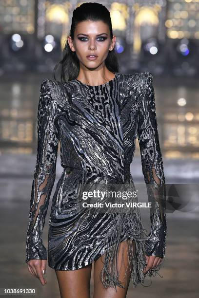 Model walks the runway at the Julien Macdonald Ready to Wear Spring/Summer 2019 fashion show during London Fashion Week September 2018 on September...