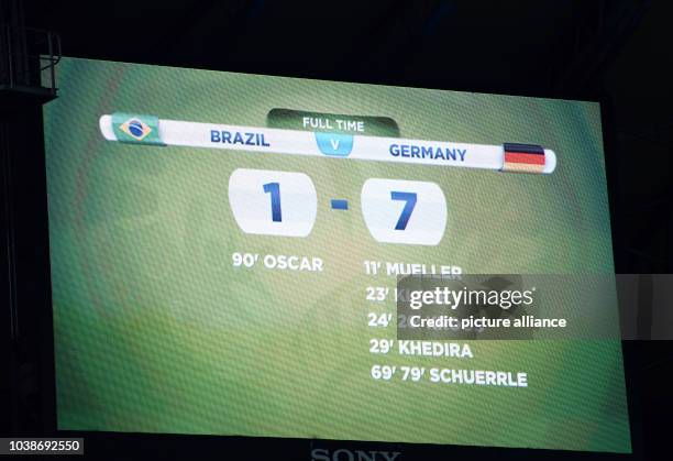 Display board shows the result as Germany thrashed Brazil with 1-7 after the FIFA World Cup 2014 semi-final soccer match between Brazil and Germany...