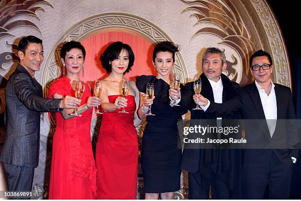 Andy Lau, Nansun Shi, Carina Lau, Li Bingbing, Tsui Hark, Zhonglei Wang attend the "Detective Dee and the Mystery of Phantom Flame" party at the...
