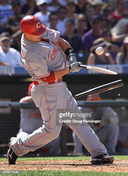 Catcher Ramon Hernandez of the Cincinnati Reds breaks his bat against the Colorado Rockies at Coors Field on September 6, 2010 in Denver, Colorado.