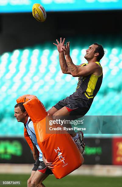 Daniel Bradshaw of the Swans marks during a Sydney Swans AFL training session at the Sydney Cricket Ground on September 7, 2010 in Sydney, Australia.