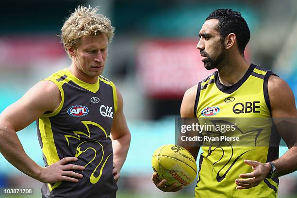 Craig Bolton and Adam Goodes of the Swans talk during a Sydney Swans AFL training session at the Sydney Cricket Ground on September 7, 2010 in...