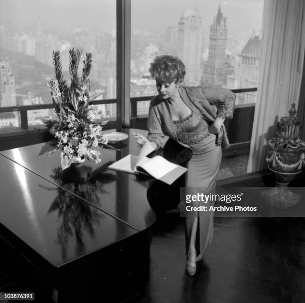American actress Lucille Ball in her apartment at the New York Hilton hotel, Manhattan, circa 1965.