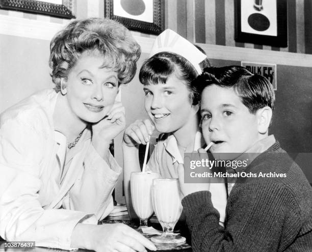 American actress Lucille Ball with her children, Lucie Arnaz and Desi Arnaz, Jr., 1962. Desi was at the time making an appearance on 'The Lucy Show'.