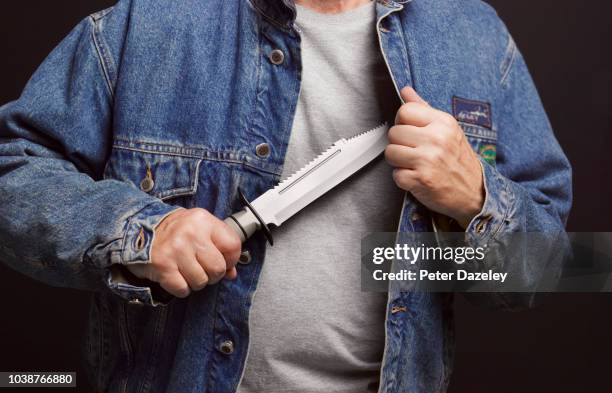 teenager armed with a knife - messer stock-fotos und bilder