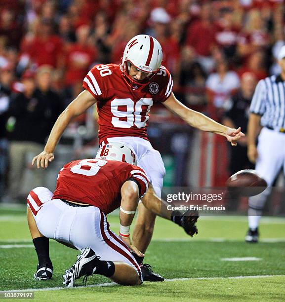 Alex Henry of the Nebraska Cornhuskers kicks an extra point against the Western Kentucky Hilltoppers during second half action of their game at...