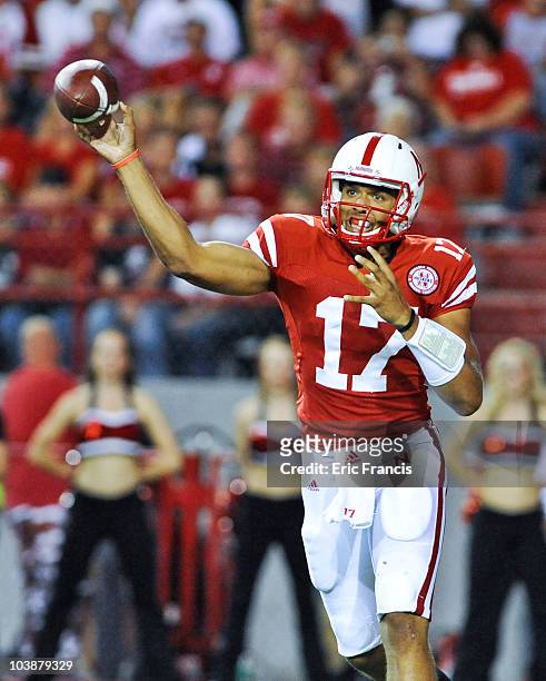 Cody Green of the Nebraska Cornhuskers passes the ball down field against the Western Kentucky Hilltoppers during first half action of their game at...