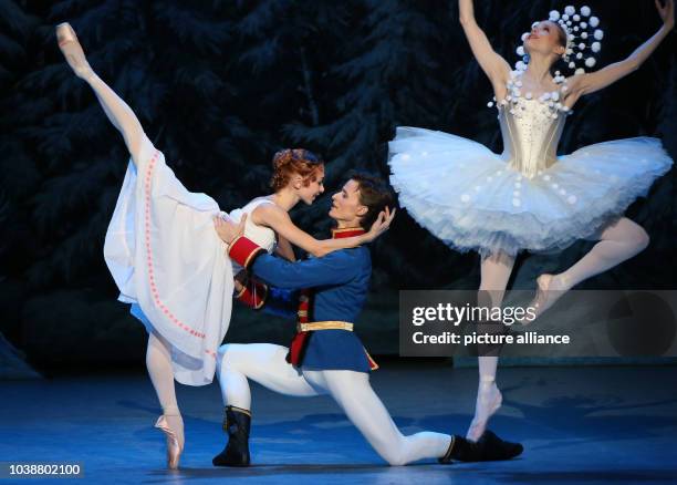 Iana Salenko as Clara and Marian Walter as Nutcracker perform during the photo rehearsal for the ballet 'The Nutcracker' at the Deutsche Oper in...