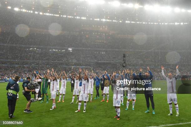 Iceland's players perform the so called Haka after the UEFA EURO 2016 quarter final soccer match between France and Iceland at the Stade de France in...