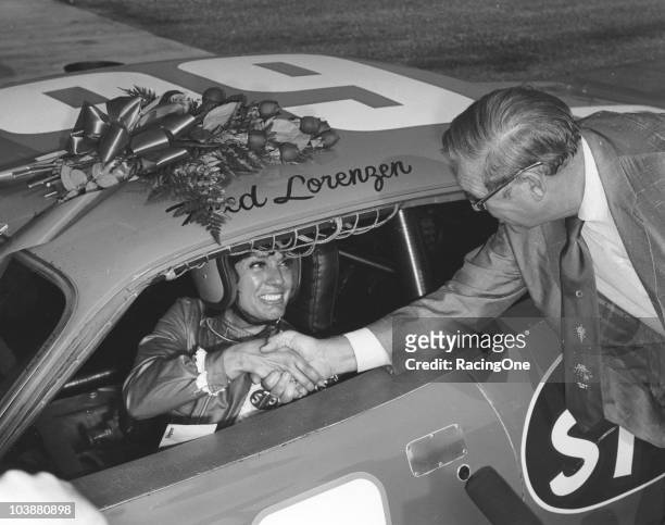 Paula Murphy chats with NASCAR President Bill France, Sr. Before her record-setting run in Fred LorenzenÕs Andy Granatelli-owned STP Plymouth at...