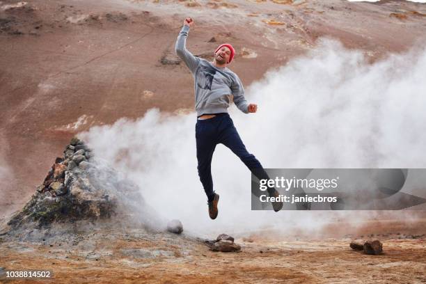 fooling around in hverarond geothermal area - sulphur stock pictures, royalty-free photos & images