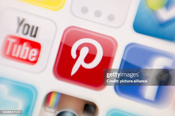 Staged photograph taken in Munich, Germany, on the 11 December 2016 shows the Pinterest logo displayed on a screen. Photo: Tobias Hase/dpa | usage...