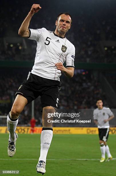 Heiko Westermann of Germany celebrates the first goal during the EURO 2012 Group A Qualifier match between Germany and Azerbaijan at RheinEnergie...