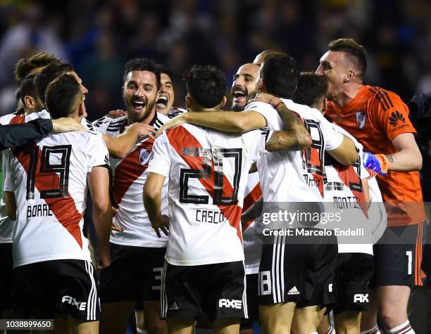 Players of River Plate celebrate after winning a match between Boca Juniors and River Plate as part of Superliga 2018/19 at Estadio Alberto J....