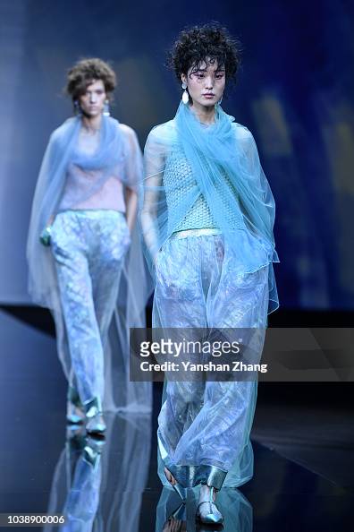 Models walks the runway at the Giorgio Armani show during Milan... News ...