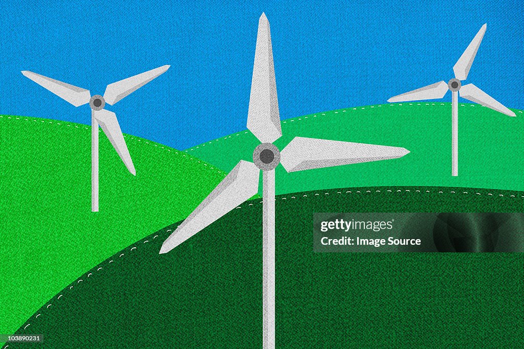 Wind turbines in field