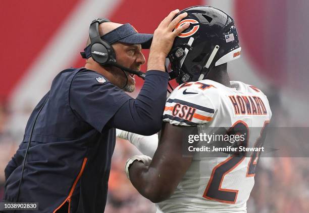 Running back Jordan Howard of the Chicago Bears celebrates with head coach Matt Nagy after scoring a one yard touchdown in the second half of the NFL...