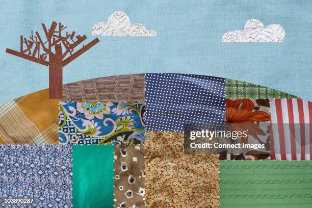 patchwork field and bare tree - appliqué stock pictures, royalty-free photos & images