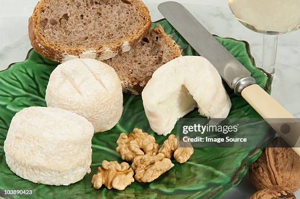 goats cheese and walnuts - goat's cheese stock pictures, royalty-free photos & images