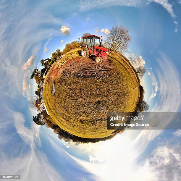 tractor in field with little planet effect - fish eye photos et images de collection