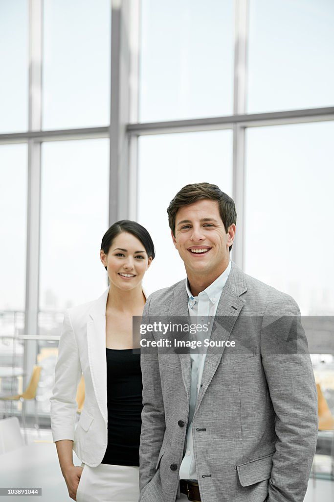 Young businessman and business woman