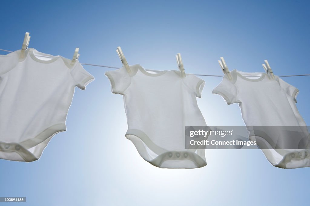 Babygros on a washing line