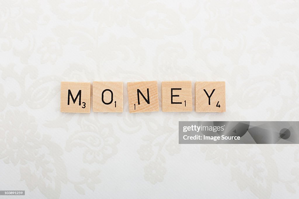 Game tile letters spelling money