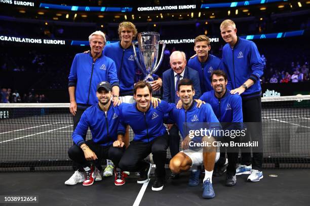 Former tennis player Rod Laver of Australia and Team Europe pose with the trophy after their Men's Singles match on day three to win the 2018 Laver...