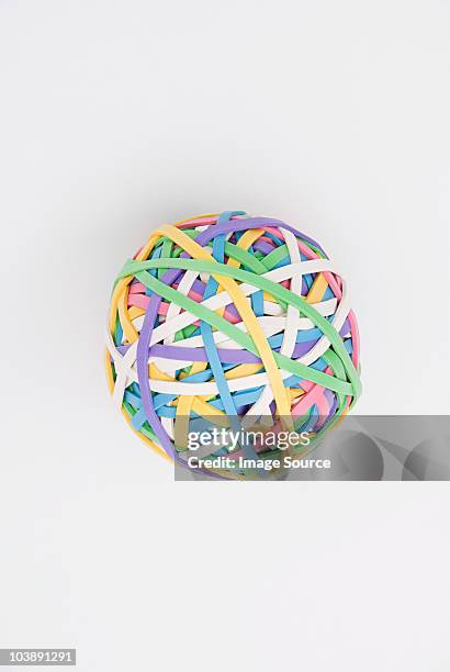 ball of rubber bands - elastic band ball stock pictures, royalty-free photos & images