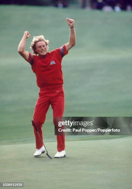 German professional golfer Bernhard Langer celebrates on a green during play in the final round to win the 1985 Masters Tournament at Augusta...