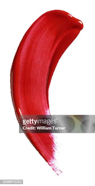 a cut out beauty product image of a smear, swipe or smudged line of red lip gloss - glossy lips stock pictures, royalty-free photos & images