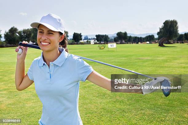 portrait of a young female golf player - golf woman ストックフォトと画像