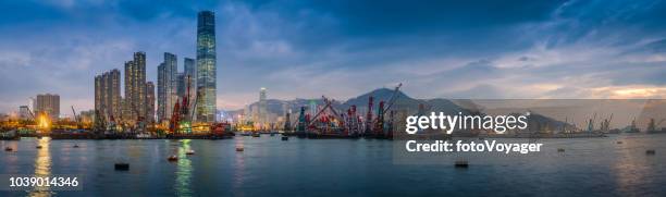 hong kong glittering skyscrapers overlooking victoria harbour sunset panorama china - kowloon stock pictures, royalty-free photos & images