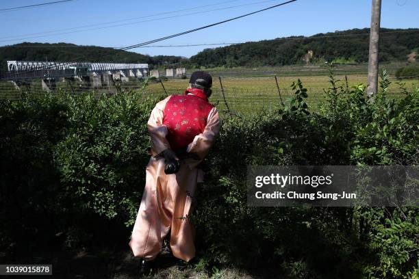 North Korean refugee Kim Soon-ki looks over a North side after pay respects to their ancestors in North Korea during a ceremony to mark the Chuseok,...